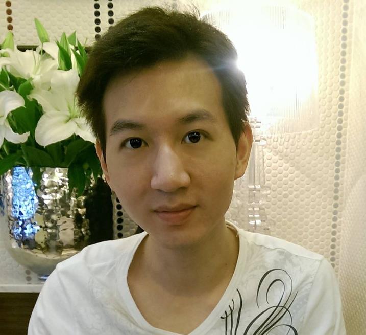 an asian male wearing white shirt